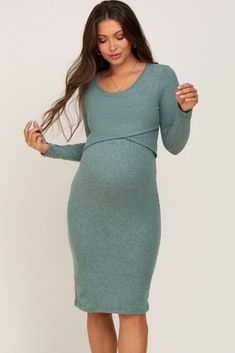 A comfortable & casual maternity dress perfect for any day!  A brushed knit maternity nursing dress featuring a wrap bust, long sleeves and a rounded neckline. The Green Brushed Knit Long Sleeve Maternity Wrap Nursing Dress is perfectly bump-friendly! Body Con Maternity Dress, Teacher Maternity Outfits, Maternity Winter Outfits, Winter Pregnancy Outfits, Percabeth Fanart, Maternity Bodycon Dress, Maternity Winter, Maternity Patterns, Winter Pregnancy