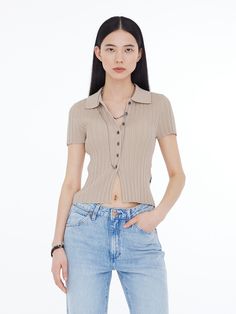 Editor's NotesThis half sleeve knit top features slim cropped fit  ribbed pattern. It can be styled in various ways.- Slim cropped fit- Ribbed pattern- Knit with good tension- Side logo label - Comfortable fitMeasurements (in.)S / M- Total length: 19.69 in. / 20.47 in.- Shoulder: 12.60 in. / 13.39 in.- Chest: 11.81 in. / 12.60 in.- Sleeve length: 6.30 in. / 6.69 in.- Hem: 11.81 in. / 12.60 in.*Model info: Height 5' 7'' / Weight 110.23 lbs / Chest 31 in. / Waist 23 in. / Hip 35 in. Collared Ribbed Knit Top, Cotton Knit Top With Ribbed Collar, Trendy Beige Cropped Knit Top, Trendy Cropped Beige Knit Top, Beige Collared Knit Top, Cotton Half-zip Top With Ribbed Collar, Fitted Textured Knit Polo Collar Top, Knitwear Cardigan, Men Shoes Size