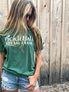 Introducing the Pickleball Brass Tacks tee, the shirt that'll have you saying "all that and a bag of chips!" With its durable cotton construction, it's the perfect pickleball companion, whether you're aiming for a score or a funny pun. Now get out there and hit 'em with your best shot! Bag Of Chips, Brass Tacks, Swimwear Store, Funny Pun, Swim Shop, One Piece Swim, Pickleball, Graphic Tee Shirts, Scarf Hairstyles