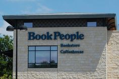 the front of a book people bookstore with trees in the background