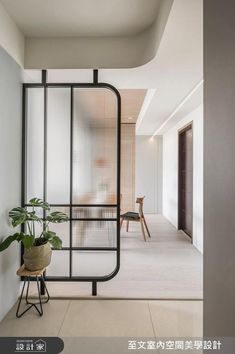 a room divider with a potted plant in it