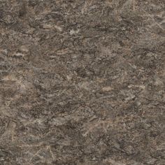 a close up view of a granite countertop with brown and tan colors on it