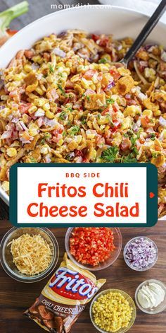 fritos chili cheese salad in a white bowl on a wooden table with ingredients around it