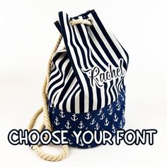 a striped bag with anchors on it and the words choose your font