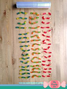 an image of colorful toothbrushes laid out on a wooden floor with text overlay