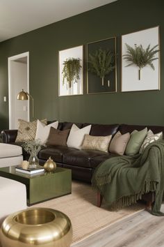 a living room filled with furniture and green walls