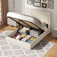 a bed that has some drawers in it