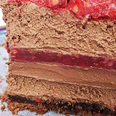 a piece of chocolate cake with strawberries on top