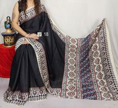 FREE Petticoat with every Saree and Legging with every Dupatta Order Pure Hand Block Print Modal Silk Ajrakh Saree, With Running BP, Organic Black Colors, Natural Dyed, Skin Friendly, Indian Silk Saree Shipping through DHL, FedEx, UPS, Indian Speed post, USPS Measurements : Saree Work : Hand Block Print Ajrakh Modal Silk  Type :  Modal Silk Ajrakh Saree/ Sari Saree Fabric: Pure Modal Silk Feel : Soft Saree Length: 5.5 Meter Running Blouse Piece Length: 1 Meter Blouse Pattern : Un stitched Saree Saree Work, Sarees For Women, Indian Silk Sarees, Stylish Sarees, Hand Block Print, Blouse Pattern, Blouse Piece, Petticoat, Block Print