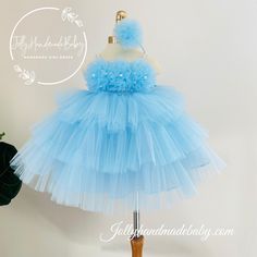 ♥ Introducing the exquisite Blue Tutu Dress, a stunning creation by Jolly Team that embodies elegance and charm. This enchanting dress features a delicate blue tulle fabric adorned with a beautifully rose accent, making it the perfect choice for special occasions or playful outings. The design showcases a cool shoulder style complemented by a pearl tide detail, ensuring a sophisticated yet whimsical look.  ♥ Crafted from high-quality materials, this dress promises both comfort and durability, al Whimsical Blue Dress For Dress-up, Elegant Blue Princess Ball Gown Dress, Elegant Blue Ball Gown Princess Dress, Elegant Blue Princess Dress For Dress-up, Elegant Ball Gown Dress For Birthday, Elegant Light Blue Gown For Dress-up, Spring Princess Style Blue Ball Gown, Whimsical Blue Dress For Dress-up Occasions, Blue Princess Gown With Ruffles