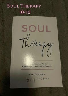 the book soul therapy is on display in front of a black and white background with pink writing