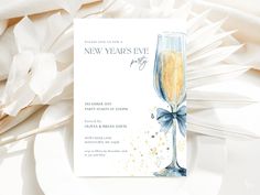 a new year's eve party card with a champagne glass and bow on it