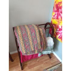 a chair with a blanket on top of it