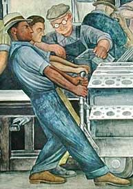 two men are working on an oven in a factory with another man looking at it