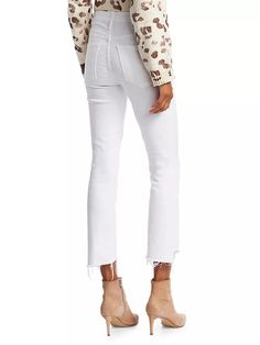 A cropped boot-cut silhouette and a frayed step hem give these high-rise stretch jeans an iconic look..Five-pocket style.Zip fly with button closure.Cotton/polyester/spandex.Machine wash.Made in USA.SIZE & FIT.Rise, about 10'.Inseam, about 26'.Leg opening, about 15'.Model measurements: 5'10'.Model is wearing US size 4.For basic alterations and hemming,.book an appointment.online at your local Saks Fifth Avenue location..ABOUT THE BRAND.An ode to growing up in California in the ’70s, Mother focuses on vintage-inspired garments with a modern touch. When Lela Becker and Tim Kaeding launched their denim brand in 2010, they fully embraced the irreverent West-Coast attitude. From its cult-status jeans in a range of fits and washes to outerwear and T-shirts touting clever phrases, the label sets Chic Cropped Jeans With Frayed Hem For Fall, White Flare Jeans With Frayed Hem, White Cropped Jeans With Frayed Hem For Fall, Fitted White Cropped Jeans For Fall, Chic White Cropped Jeans For Fall, How To Stretch Boots, Cut Off Jeans, Denim Branding, Stretch Jeans