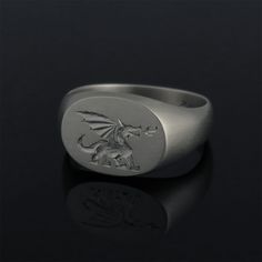 Solid 14K / 18K yellow, white or rose gold custom engraved signet ring for women. Minimalist and modern personalized signet ring made of solid gold. This beautiful signet ring can be customized just for you by adding a detailed hand engraved design - instead of the dragon. It can be initials, name, date, insignia or illustration of your choosing. Contact me for a quote. This ring can be used also as a pinky or an alternative wedding ring. It is perfect for everyday wear and will go with any look Alternative Wedding Ring, Engraved Signet Ring, Pinky Signet Ring, 14k Gold Wedding Ring, Signet Rings Women, Alternative Wedding Rings, Signet Ring Men, Mens Gold Rings, Engraved Design