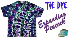 tie dye t - shirt with an image of purple flowers on the front and green, blue