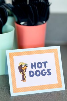 there is a card that says hot dogs on it