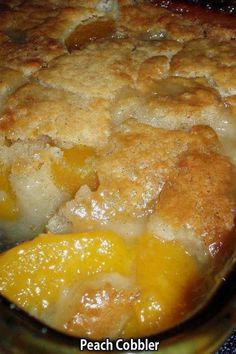 a close up of a casserole with oranges in it