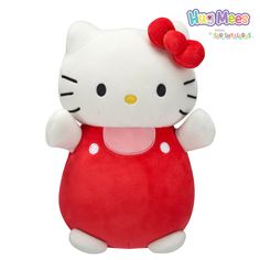 a hello kitty stuffed animal with a red dress