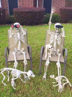 two lawn chairs made to look like skeletons