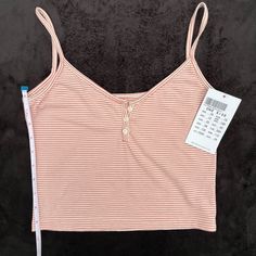 Brandy Melville Striped Crop Top Pinkish-Red/Cream Striped Nwt One Size Pink Cotton Cami Top, Pink Crop Top Camisole, Pink Summer Crop Top Camisole, Pink Crop Top Camisole For Summer, Pink Crop Top Camisole Casual, Pink Casual Crop Top Camisole, Casual Pink Crop Top Camisole, Trendy Pink V-neck Camisole, Spring Pink Crop Top Camisole