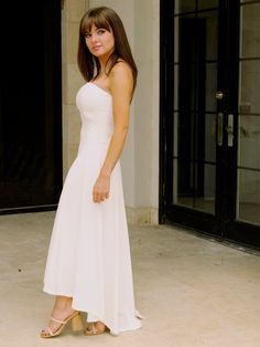 Get ready to say "I do" to our Miss White Midi Dress! This strapless flowy stunner features a high-low design and is just what you need for all your pre-wedding festivities as a Bride-to-Be! Product Description: Fit: Fits true to size Material: Self - 78% Polyester, 22% Spandex, Lining - 95% Polyester, 5% Spandex Payton (5'2) is wearing size Small. Strapless Bridesmaid Dress For Summer Wedding, Strapless Summer Bridesmaid Dress, White Strapless Midi Prom Dress, Summer Strapless Bridesmaid Dress For Wedding, One-shoulder Midi Dress For Weddings And Prom, One Shoulder Midi Dress For Wedding And Prom Season, White Flowy Bridesmaid Dress, Wedding Strapless Dress With Fitted Bodice And Midi Length, Elegant Flowy Strapless Sleeveless Dress