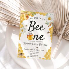 a bee themed birthday party is set up on a plate