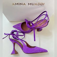 These Purple Amina Muaddi Karma 95 Crystal Suede Pumps Feature A Pointed Toe, Sculpted 95 Mm Heel, All-Over Embellishments, Branded Leather Insole And Slingback Strap With Ankle Tie Detailing. If Our Actions Determine Our Future Fate, We're On Our Best Behaviour. We're After Some Good Karma By Way Of These Amina Muaddi Pumps, Please. This Piece Fits True To Size. We Recommend You Select Your Regular Size. Luxury Purple Heels, Mach Mach Shoes Purple, Amina Muaddi Purple Heels, Purple Crystal Embellished Heels For Evening, Purple Crystal Embellished Evening Heels, Hand Embellished Heels For Evening, Hand Embellished Heels For Party, Embellished Purple Heels For Evening, Chic Embellished Purple Heels