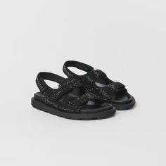 Plain Sandals With Rhinestones And Grooved Soles. Velcro Strap At Back. Two Velcro Straps On The Instep For A More Comfortable Fit. Rubber Sole. Black Top: 86% Polyamide, 14% Elastane Lining: 86% Polyamide, 14% Elastane Sole: 100% Rubber Insole: 100% Polyurethane Size 3.5 Eur 35 New With Tag Smoke And Pet Free Home Black Rhinestone Round Toe Sandals, Black Rhinestone Sandals With Round Toe, Casual Black Sandals With Rhinestones, Navy Blue Sandals, White Strappy Sandals, Zara Sandals, Green Sandals, Boys Sandals, Toddler Sandals