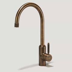 an image of a kitchen faucet in bronze