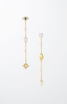 Online Only! See style in a new light with the Charms & Opal Dangle Earrings from Ettika. These earrings include brass and steel, cubic zirconia, and a post-back closure to keep your earrings secure and in place. 


	18k gold plated
	Brass & steel
	Cubic zirconia
	Acrylic
	3.15"
	Post back Cubic Zirconia Dangle Earrings With Charms, Cubic Zirconia Drop Earrings With Dangling Charms, Cubic Zirconia Dangle Earrings, Brass Dangle Earrings With Plating, Dangle Brass Earrings With Plating, Silver Dangle Crystal Earrings Gold Plated, Celestial Style Drop Earrings With Dangling Charms, Gold Plated Dangle Crystal Earrings, Celestial Drop Earrings Tarnish Resistant