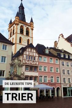 an old building with a clock tower in the background and text overlay that reads de lukste tips trier