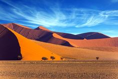 Best national parks || Namibia tourism || Etosha App Best National Parks, Deserts Of The World, Namib Desert, African Travel, National Park Photos, Southern Region, Helicopter Tour, The Dunes, Iconic Landmarks