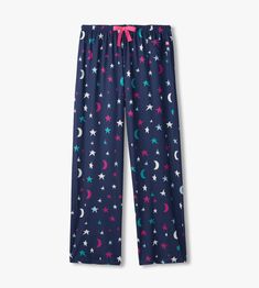 Gaze upon the night sky from the comfort of your home with our Women's Starry Night Pajama Pants, crafted from a cozy polyester and spandex blend. These pants are a celestial delight, perfect for star-studded dreams and peaceful nights. 95% Polyester, 5% Spandex Straight leg pant with relaxed fit Waistband with elastic encased Functional twill tape drawcord Single patch pocket at wearer's left front hip Packaged in a matching drawstring bag for easy gifting Machine washable Cool Pj Pants, Star Pj Pants, Unique Pj Pants, Cheap Playful Bedtime Pants, Star Wars Pj Pants, Night Pajama, Pj Pants, Holiday Specials, Twill Tape