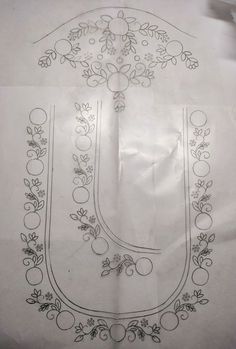 the letter u is made up of fruit and flowers on white paper with black ink