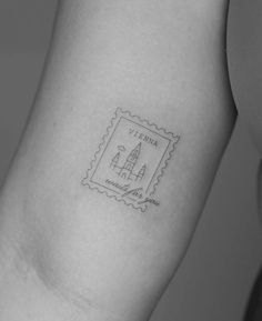 a stamp on the back of a woman's arm