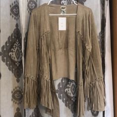 Never Worn Western Fringe Jacket Bohemian Long Sleeve Leather Jacket For Fall, Bohemian Long-sleeve Leather Jacket For Fall, Beige Long Sleeve Outerwear With Fringe, Chic Outerwear With Fringe, Chic Long Sleeve Outerwear With Fringe, Long Sleeve Fringe Outerwear For Spring, Bohemian Beige Outerwear For Fall, Spring Long Sleeve Fringe Outerwear, Fitted Long Sleeve Outerwear With Fringe