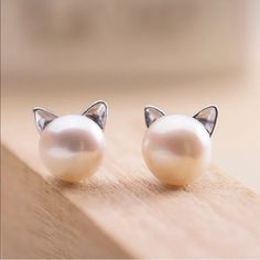 Brand New Boutique Item Gorgeous Cat Ears Little Pearl Earrings. Girly Design Light Earrings. Pretty Jewelry Accessories. Earrings With A Simulated Pearl And Kitten Ears Design. Simulated Round Pearl Earring Stud Silver Metal Cute Cat Earring. Perfect For A Small Birthday Present Or A Christmas Gift For An Elegant Lady Or Girly Girl. Bundle And Save! 3 For 30$ All Earrings With A . Elegant Cat Ears Jewelry With Cat Design, Cute White Cat Ears Jewelry, Elegant White Cat Design Jewelry, White Cat Design Jewelry With Cat Ears, Elegant White Jewelry With Cat Design, Cute White Cat Design Jewelry, Cute White Jewelry With Cat Design, White Cat Design Earrings, Cute Cat Design Earrings For Party