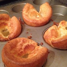 four muffins in a pan with one missing