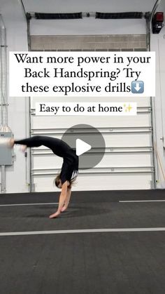 a woman is doing a handstand on the floor