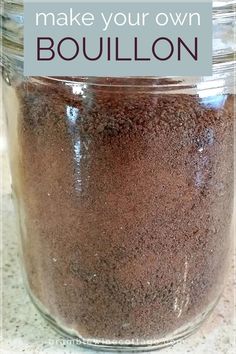 a jar filled with brown stuff sitting on top of a counter next to a blue sign that says make your own bouillon