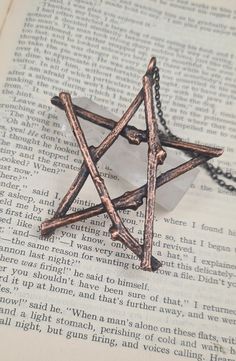 A lovely copper electroformed pentagram made using real twigs. Copper is seen as a positive energy in the spiritual world, creating calmness and clarity. Combined with the shape of the pentagram, a symbol of protection. An  amazing lucky talisman to own. As this is pendant is made from copper it may tarnish with age, which I feel adds to the character of the pendant.To clean rub gently with a soft polishing cloth. This pendant is available on a choice of brown or black 2mm adjustable cord, maximum length when fully open is 24 inches. Also is available on a gunmetal grey chain which comes in a choice of length. To clean rub gently with a soft polishing cloth. To protect your necklace remove when washing, swimming, and sleeping. The Pentagram, Witch Pendant, Rose Quartz Necklace Pendants, Spiritual World, Pagan Necklace, Wiccan Necklace, Pentagram Necklace, Halloween Pendant, Pentagram Pendant