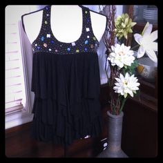 American Rag Sleeveless Black Ruffled And Beaded Top, Nwt Black Ruffled Tank Top, Black Ruffled Sleeveless Tank Top, Black Sleeveless Ruffled Tank Top, Sleeveless Black Ruffled Tank Top, Ruffled Tank Top For Parties, Ruffled Sleeveless Party Tank Top, Ruffled Party Tank Top, Party Tank Top With Ruffles, Party Ruffle Tank Top