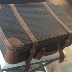 Fabulous Decorator Accent Piece. Old,Well-Worn Lv Suitcase Not Meant For Actual Travel But A Fabulous Decor Item.Brown &Tan Monogram Coated Canvas Louis Vuitton Vintage French Co.Monogram Suitcase 70 W/Brass Hardware,Rolled Top Handle,Brown Leather Trim,Creme Canvas Lining,2 Pockets On Int. Walls,2straps&Patina Discoloring Zip-Around Closure W/Additional Buckle Closures At Top.Worn,Vintage,Used Condition. No Date Code Tarnishing & Surface Scratches,Scuffs, Peeling & Wear On Exterior. Handle Drop Upcycled Louis Vuitton Luggage, Vintage Luxury Bag With Waxed Finish, Luxury Vintage Waxed Finish Bag, Vintage Louis Vuitton Luggage, Louis Vuitton Vanity Case, Vintage Louis Vuitton Luggage Antiques, Vintage Suitcase, Selling On Poshmark, Vintage Louis Vuitton