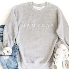 Gameday Sweatshirt, Football Sweatshirt, Fall Sports Sweatshirt, Gameday Shirt, Football Gameday Shirt, Super bowl Sweatshirt, Crewneck Sweatshirt *BLACK LETTERING AVAILABLE ON WHITE CREWNECK* *WHITE LETTERING ON ALL OTHER CREWNECK COLORS* *These cozy sweatshirts are absolutely PERFECT for any situation<3 *The unisex heavy blend crewneck sweatshirts are pure comfort. These garments are made from polyester and cotton. This combination helps designs come out looking fresh and beautiful. The collar is ribbed knit, so it retains its shape even after washing. There are no itchy side seams on these sweaters.  *Details: .: 50% cotton, 50% polyester .: Medium-heavy fabric (8.0 oz/yd² (271.25 g/m .: Loose fit .: Sewn-in label .: Runs true to size *Unfortunately, we do not accept exchanges, cancella Football Season Sweatshirts, Football Gf Sweatshirts, Football Gameday Shirts, Sports Sweatshirt Designs, Football Sweatshirt Designs, Fall Football Outfits, Football Sweaters, Gameday Outfit Football, Gameday Sweatshirt