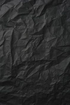 an image of black paper texture background