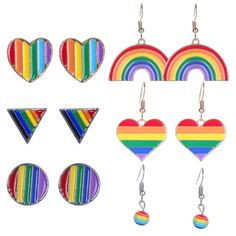 four pairs of earrings with rainbow designs on them