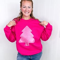 Hot Pink Glitter Christmas Tree Crewneck Fleece Sweatshirt Embark on your holiday celebrations in classic style and a sumptuous sparkle of pink glitter with this limited-edition crewneck. Its vibrant color and glimmering glamour will ensure that you make a lasting impression no matter the occasion, while the cozy construction and upscale accents keep you looking and feeling your finest. So as the temperatures take a dip, commemorate the season in opulent refinement with this shimmering, fashiona Festive Holiday Crew Neck Sweatshirt, Winter Crew Neck Top With Glitter Print, Winter Glitter Print Crew Neck Top, Pink Glitter Christmas, Glitter Christmas Tree, Hot Pink Glitter, Glitter Christmas, Fleece Sweatshirt, Holiday Celebration