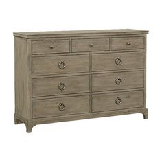 an old dresser with many drawers and knobs on the bottom drawer, in grey wood